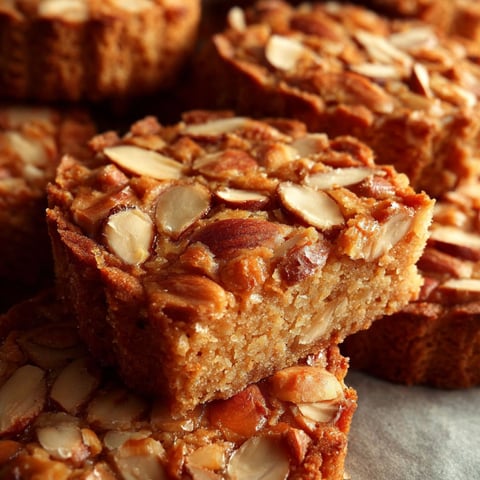 Une photo de miel et amandes.
